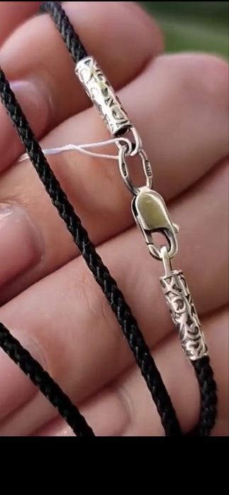 Срібний хрестик дитячий із шнурочком