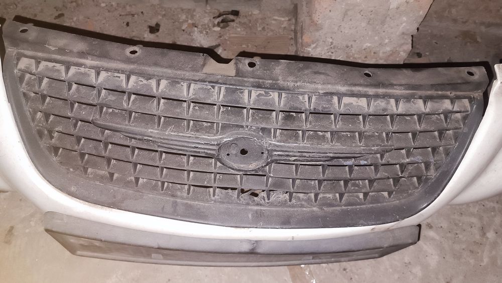 Решетка бампера радиатора Крайслер статус Додж Cirrus