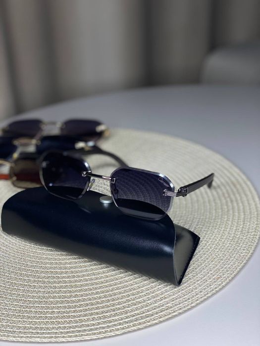 Сонцезахисні окуляри Cartier 7052 безободкові унісекс