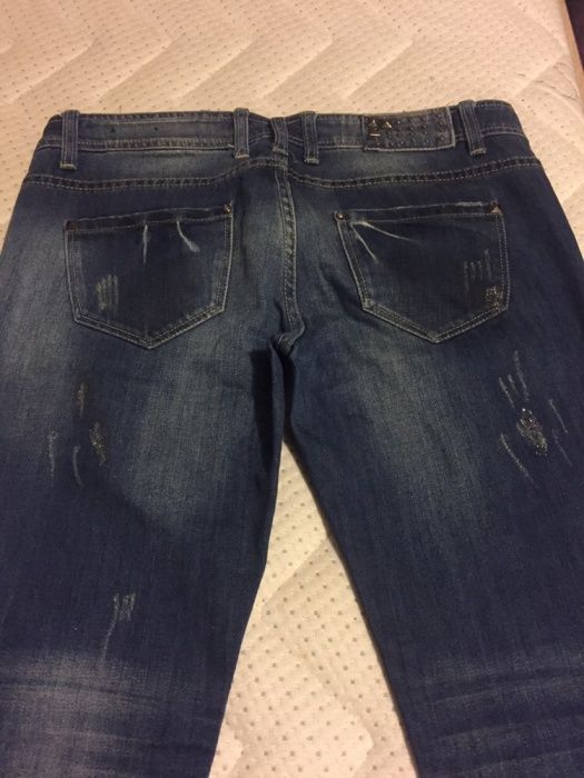 Spodnie jeansy W28