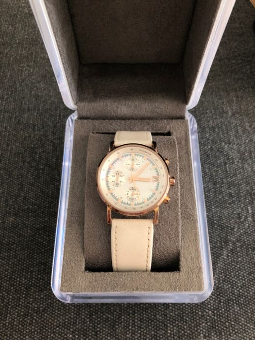 Zegarek DKNY rose gold z białym paskiem i tarczą