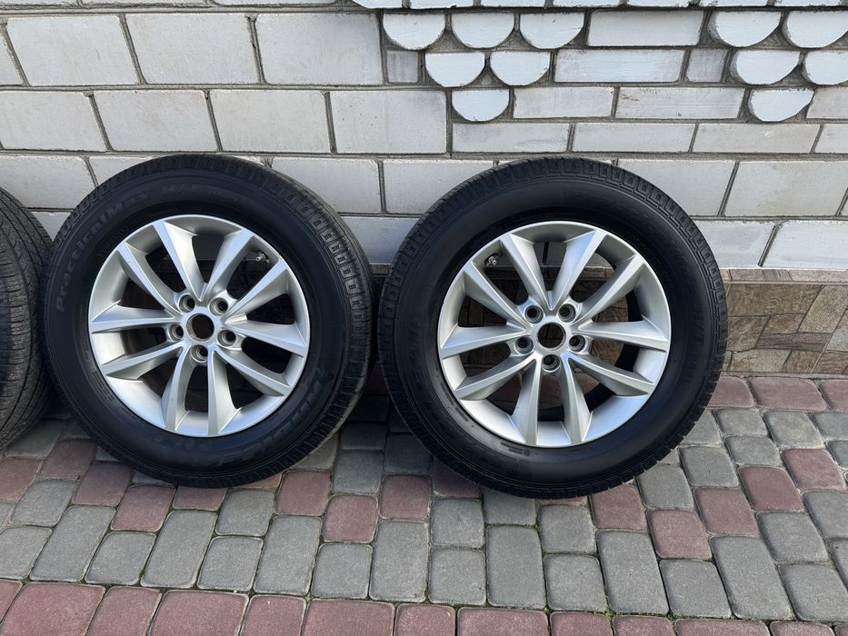 Комплект оригінальних дисків з шинами 5.114.3 R17.