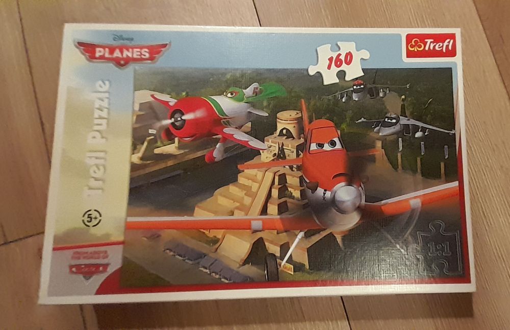 Puzzle Trefl 160 elementów komletne Planes Samoloty Lot nad krajem Chu