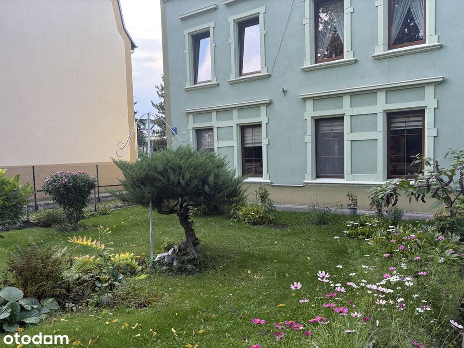 Mieszkanie z ogródkiem, garażem nad uroczym strumieniem