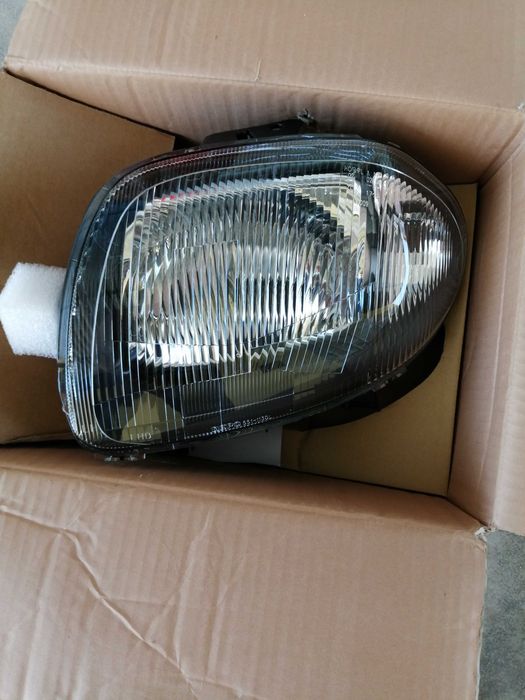 Farol Renault Clio 99