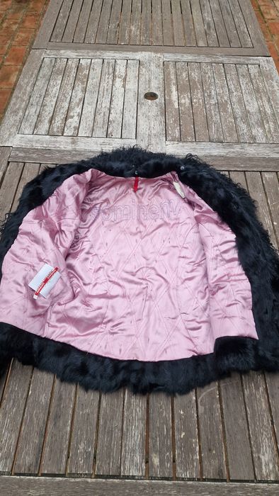 Casaco de pele verdadeira.