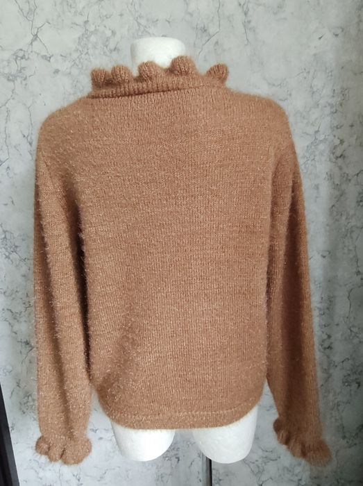 Puszysty włoski sweter damski.