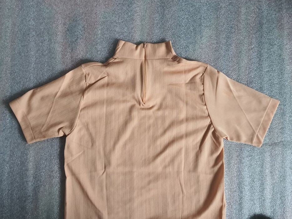 Блузка нова (44р.) виміри на фото!