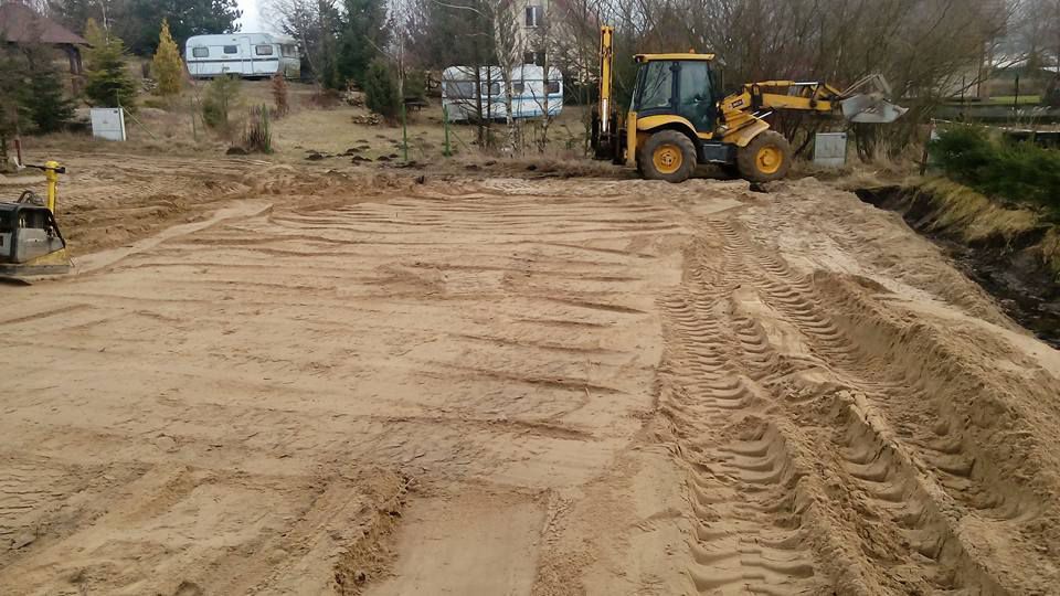 roboty ziemne koparki JCB kruszywo rozbiórka wykopy transport