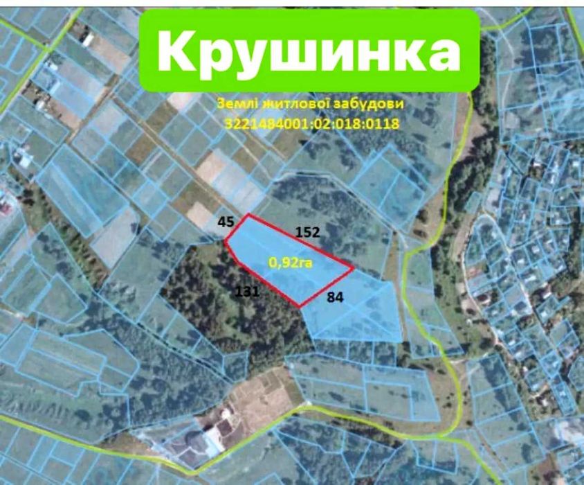 Рівна ділянка з асфальтованою дорогою та комунікаціями
