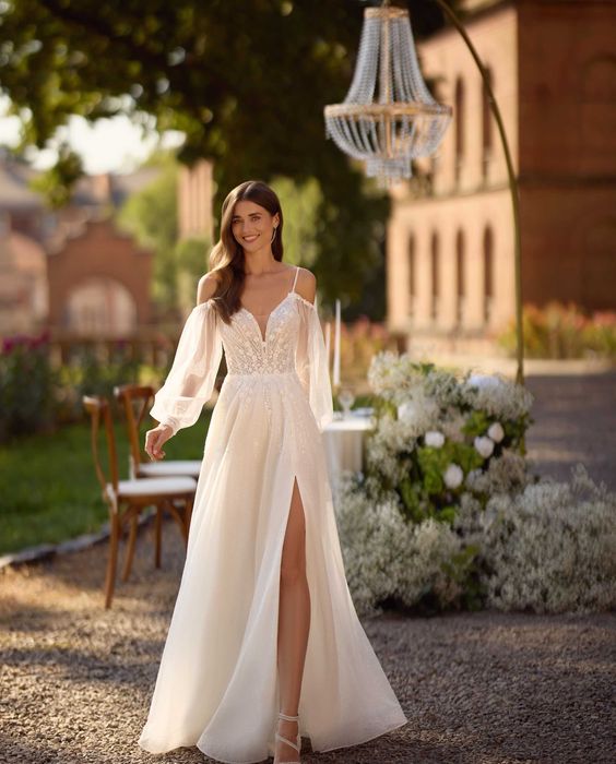 Polecam piękną suknię ślubną