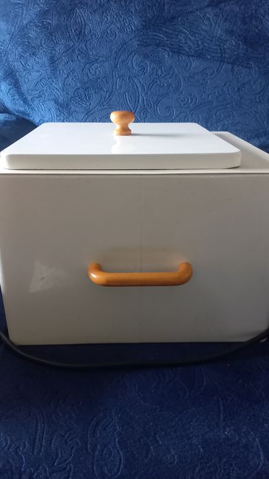 Panela de cera quente.