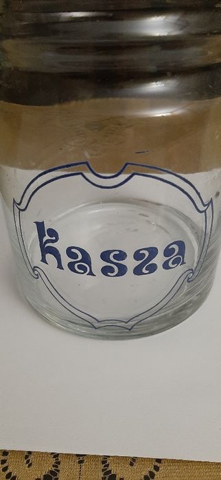 słoik szklany z drewnianą przykrywką PRL oraz dodatkową przykrywką