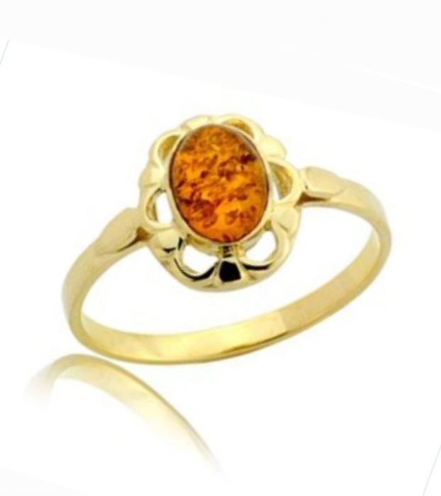 Złoty pierścionek 585 z bursztynem w ażurowej oprawie r 16