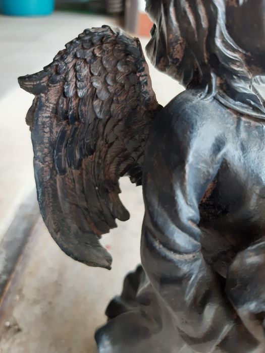 Anjo em massa com vela