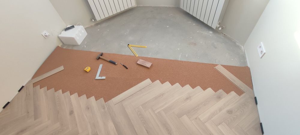 Укладка ламінату, паркетної дошки, вінілового покриття