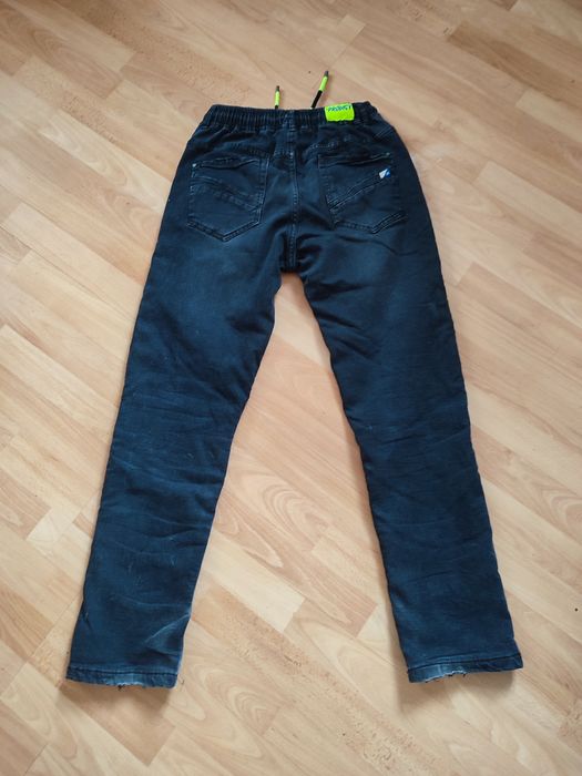 Продам утеплені джинси на хлопця  підлітка 170см,