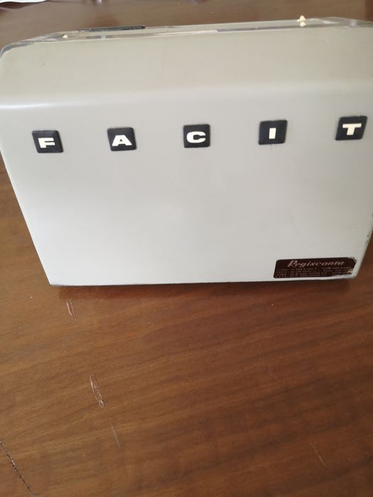 Máquina de calcular com fatura época