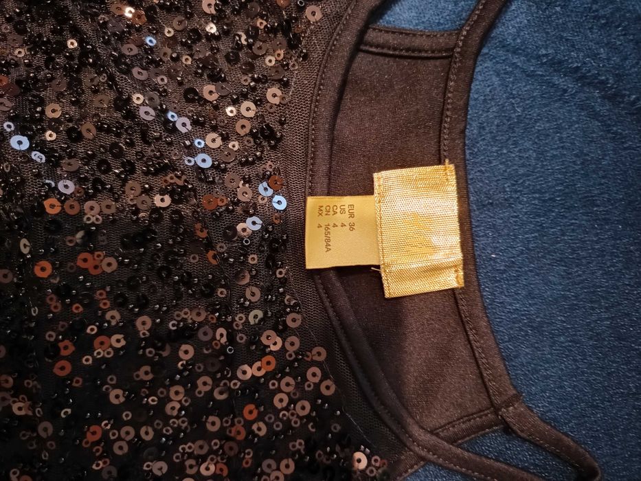 Czarna sukienka z cekinami H&M