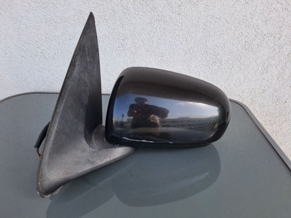 Retrovisor esquerdo Nissan Almera N16
