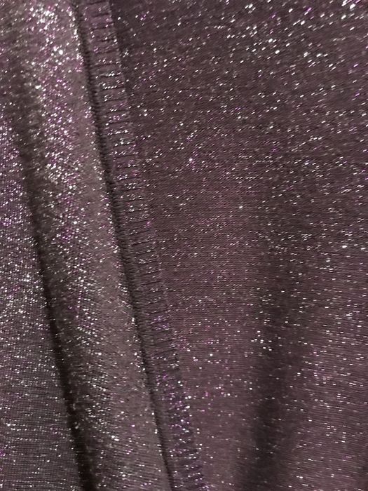 Sweterek narzutka ze srebrzystymi nitkami typu brokat