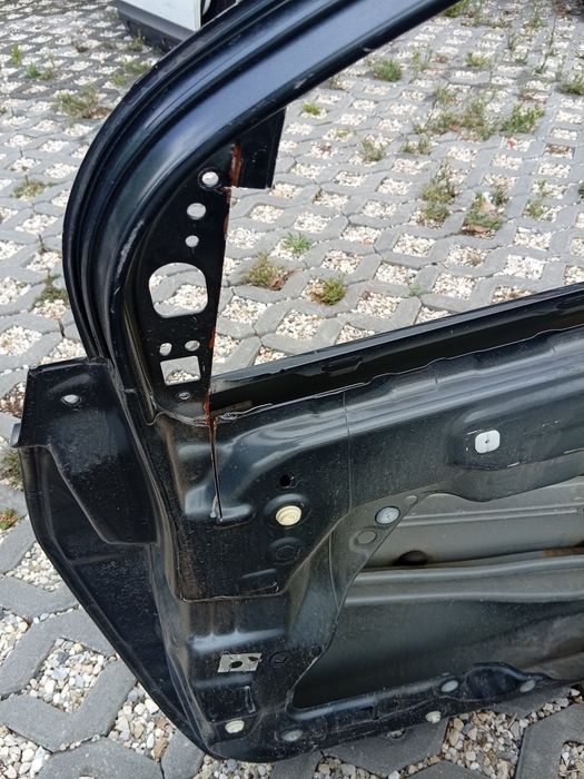 Porta frente Dir Mazda 2 com toques