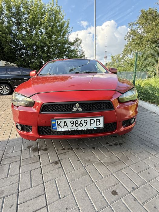 Lancer 10 2011 2.0 автомат / газ