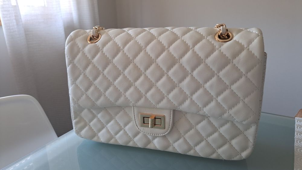 Channel-style suitcase