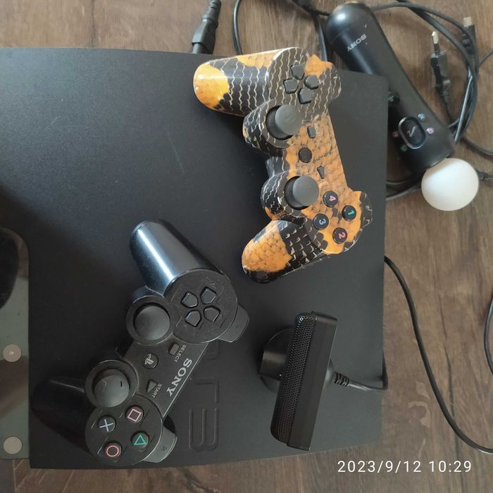 Ps3, dwa pady, kontroler move, kamera. 14 gier