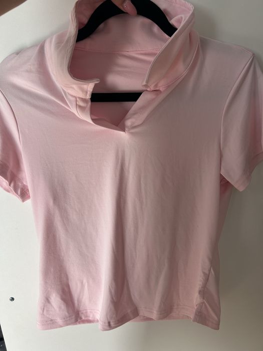 поло рожевого кольору