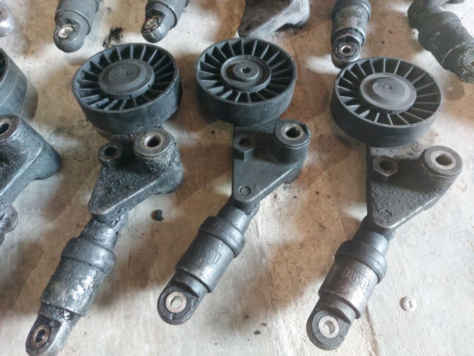 Натяжний механізм з роликом ремня генератора ОПЕЛЬ 2.0, 2.2 dti