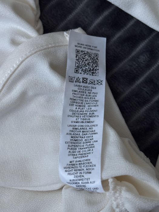 Блуза молочного кольору з декольте, розмір XS/S