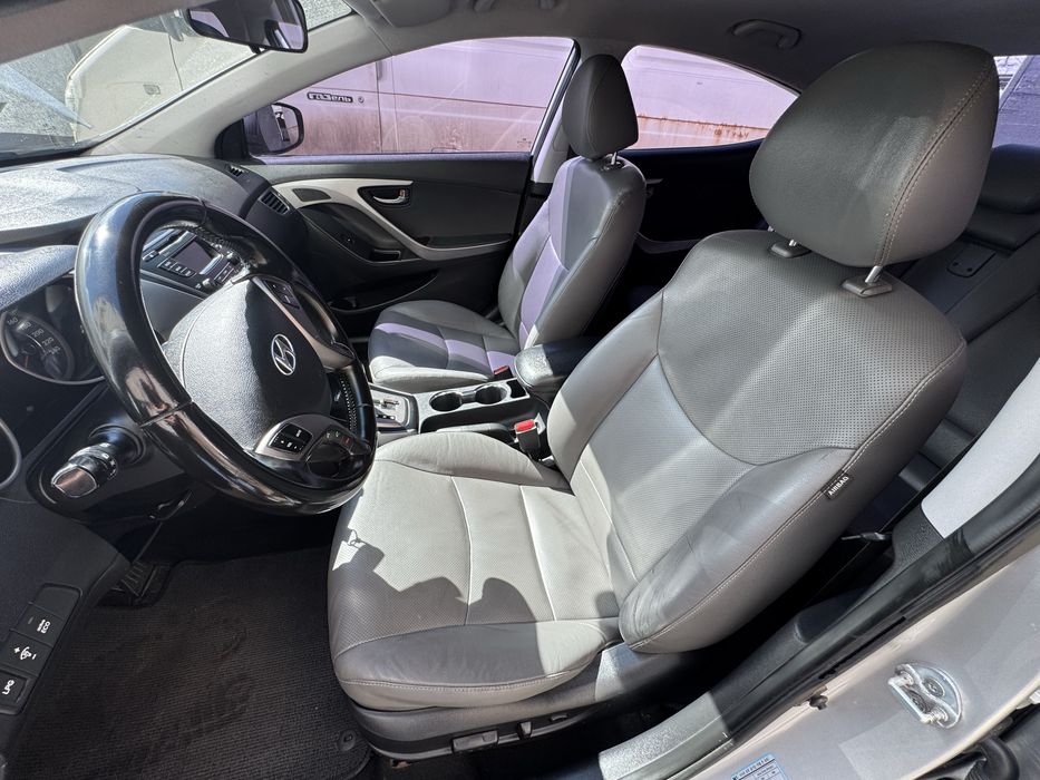 Hyundai Avante 2013 VIN KMHDG41LBEU877352 фото оголошення 7 з 8
