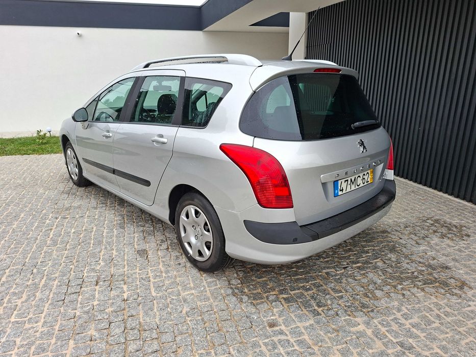 Peugeot 308 SW 7 lugares teto panorámico