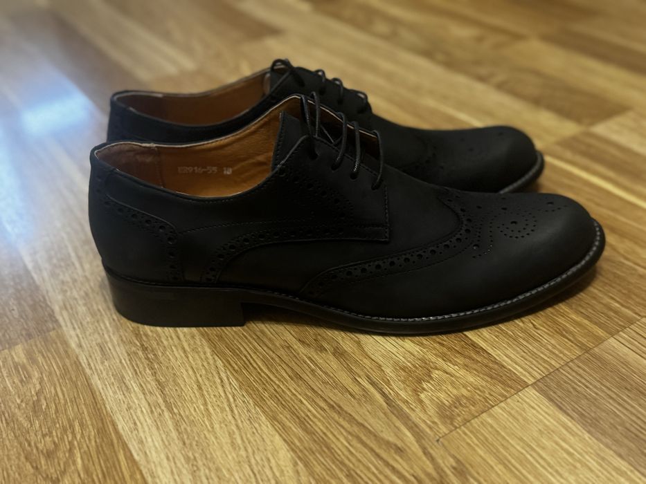 Нові чоловічі туфлі