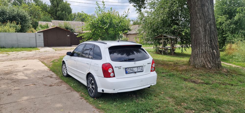 Мазда 323 Protege5 GXI