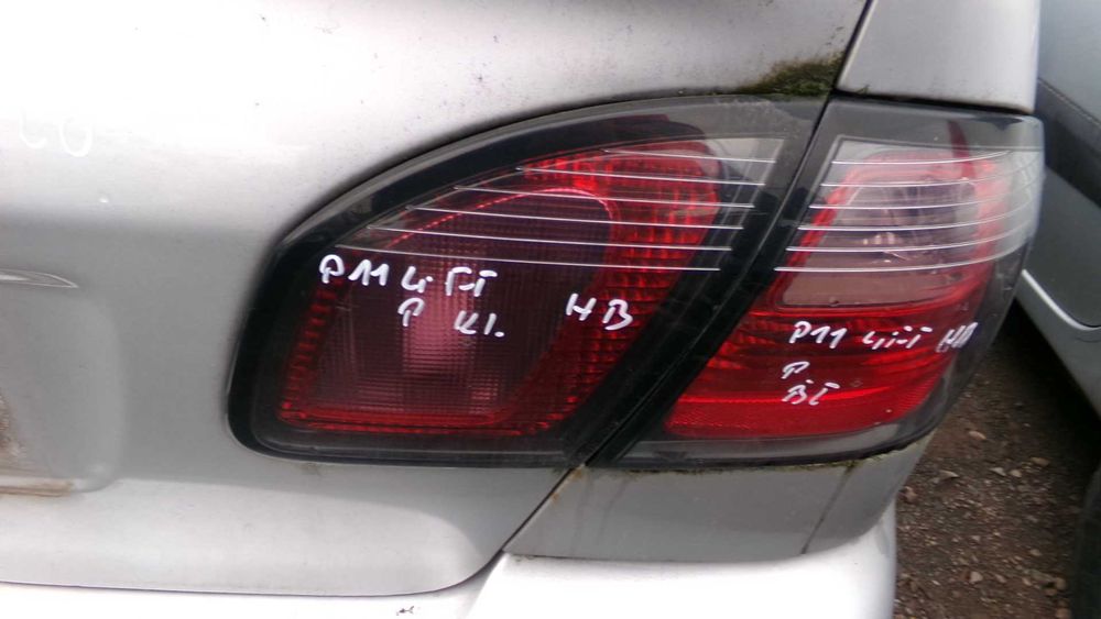 Cze66 Lampa prawa tylna w klapę nissan primera p11 EU HB lift wysyłka