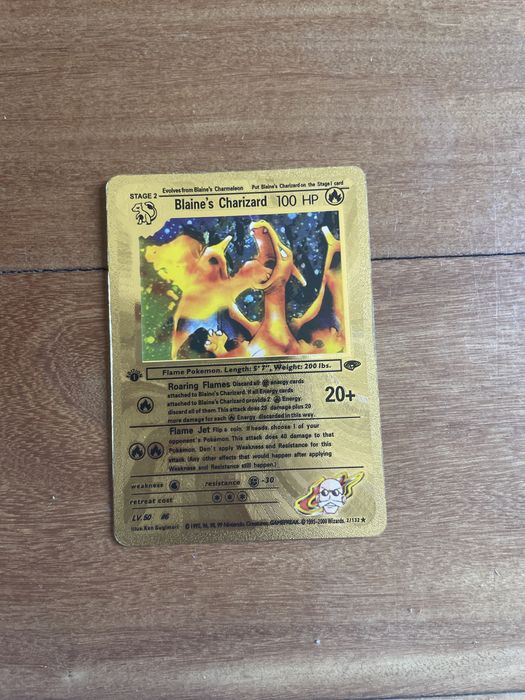 Carta Pokémon Blaine’s Charizard (002/132)