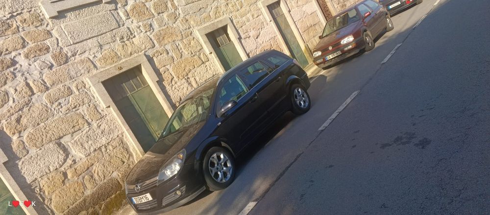 Opel astra caravan h foto 2
