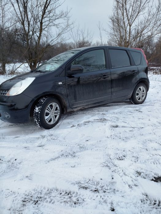 Нісан ноте бензин низина зимова нові стойки