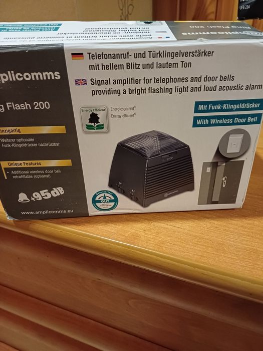 Wzmacniacz telefonu i drzwi z lampą błyskową
