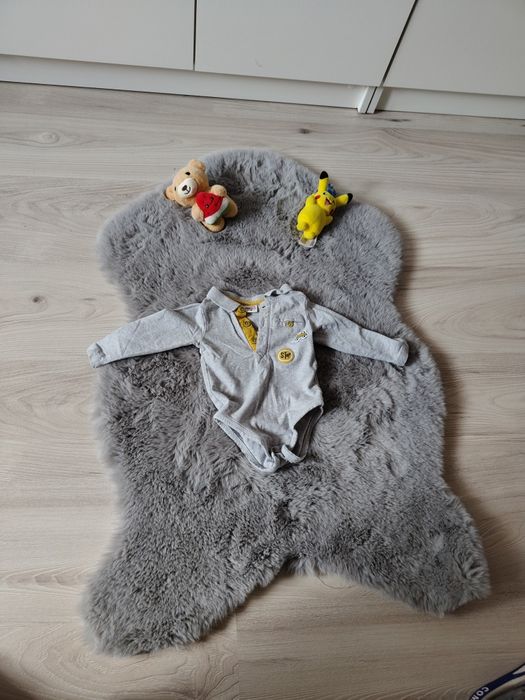 Stylowe koszulowe body na długi rękaw.