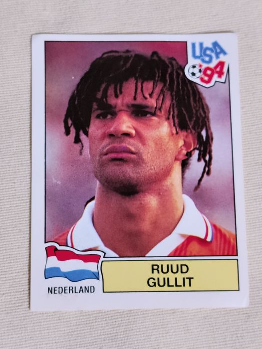Cromo  neerlandês Ruud Gullit, especificamente  número 427 da coleção Panini World Cup 1994 alusivo ao Campeonato do Mundo de Futebol de USA '94.