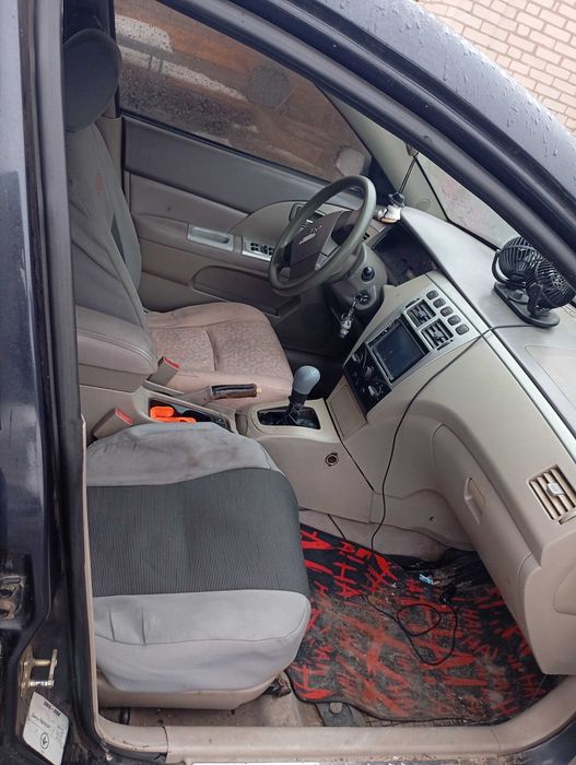 Чері Елара сідан