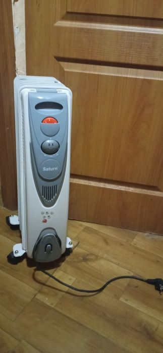 Обігрівач масляний Saturn