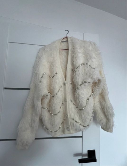 Sweter z aplikacjami