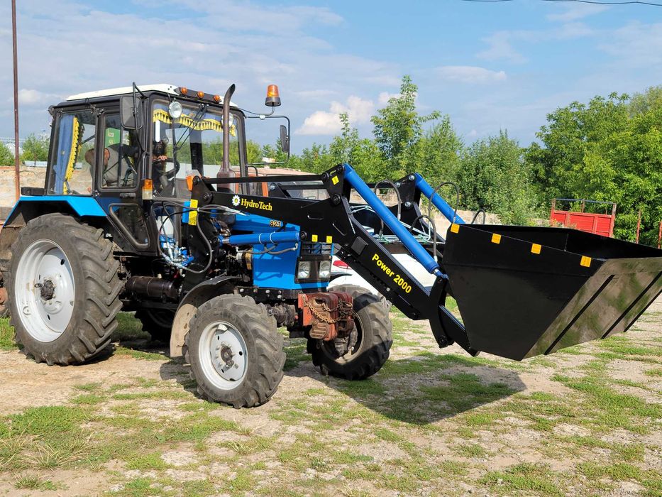 Быстросйомный фронтальный погрузчик кун Юмз