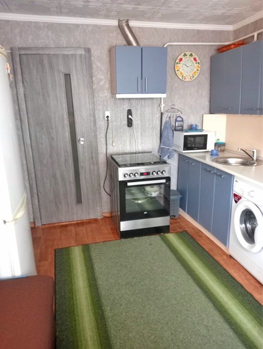 Продам квартиру двоповерхову,гараж,погріб,город