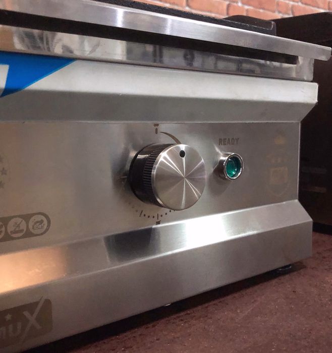 Placa de grelhar de ferro elétricas e a gás