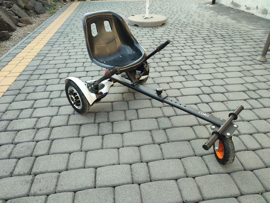 Hoverboard plus przystawka jeździk.